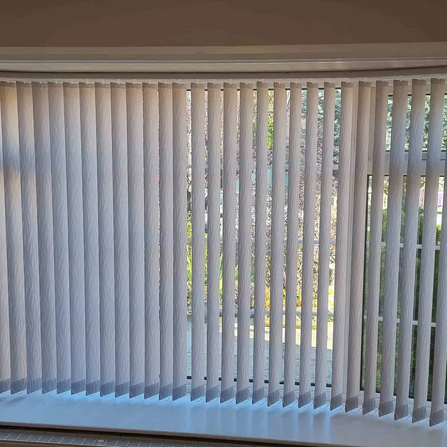 white vertical blinds